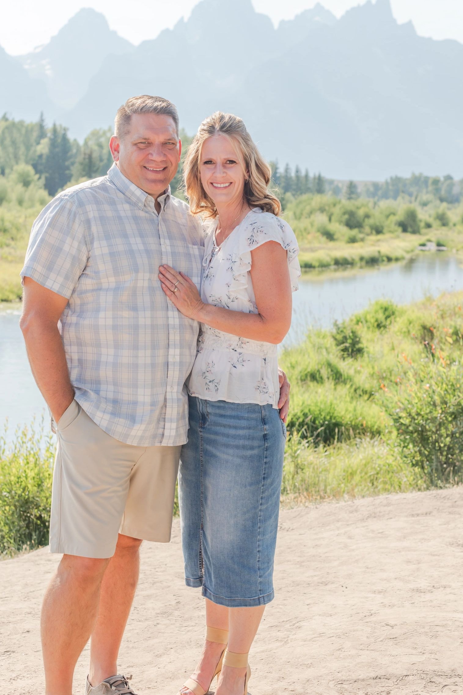 Couple enjoying a scenic mountain landscape
